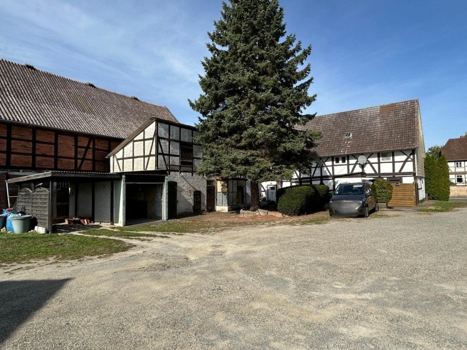 Blick vom Grundst�ck aufs Haus Zweifamilienhaus Fl�the